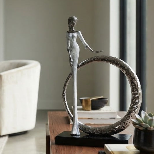 Abstract Silver Figure with Textured Ring Sculpture at Zubaidas Homestore
