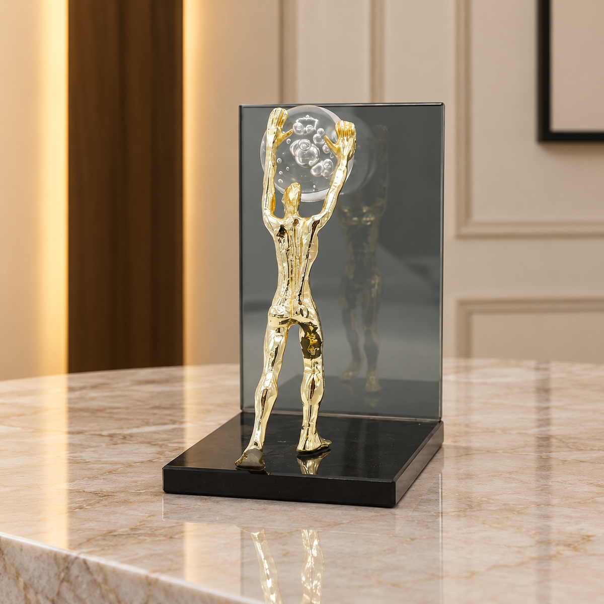 Man Holding Crystal Ball Sculpture at Zubaidas Homestore