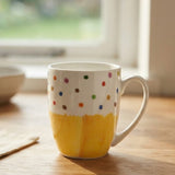 Multi Color Polka Dots Yellow Base Ceramic Mug 350ml at Zubaidas Homestore
