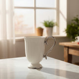 Porcelain Footed Coffee Mug with Silver Handle at Zubaidas Homestore